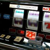 Slot machine reels spinning on digital display