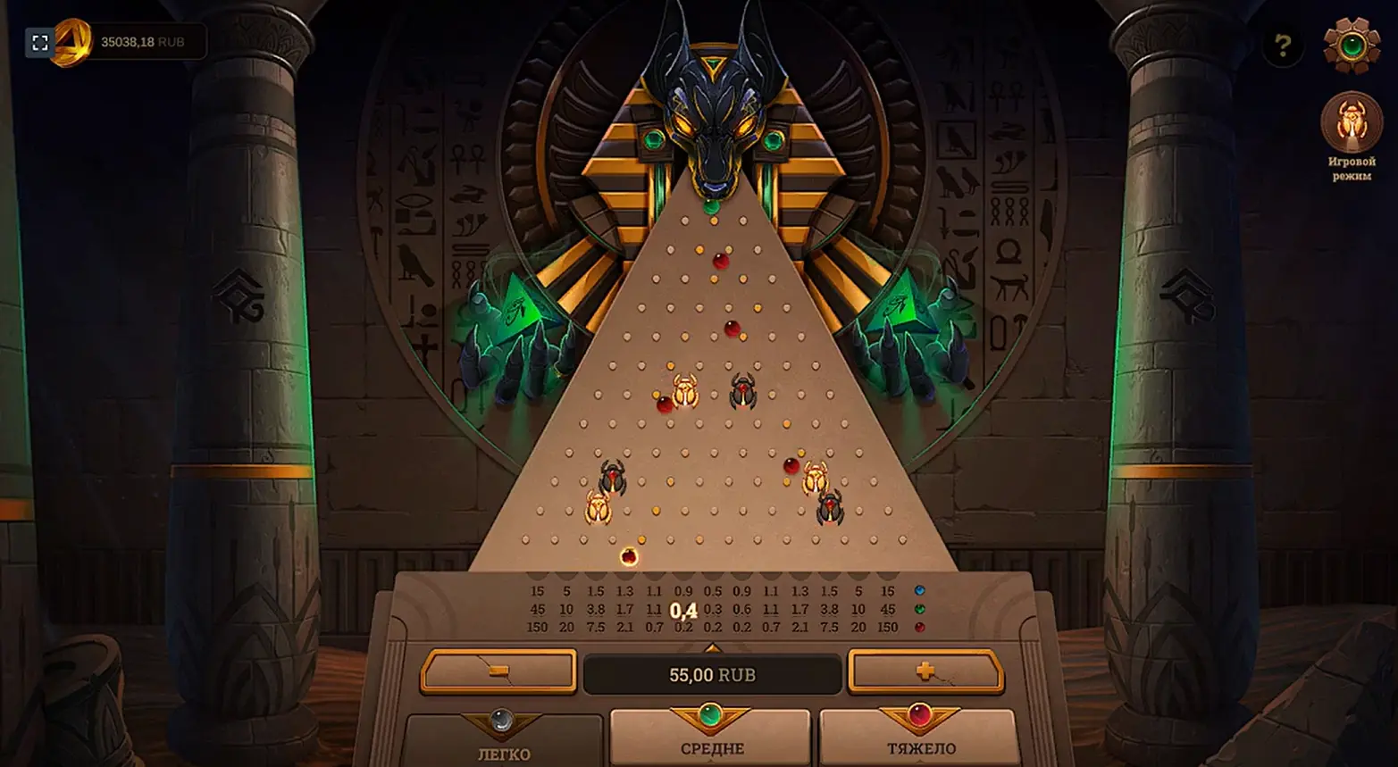 ANUBIS Plinko game interface showing Egyptian style graphics