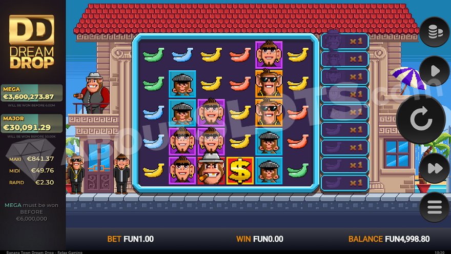 Game field of Banana Town Dream Drop slot with a large house and three dressed monkeys on the left.