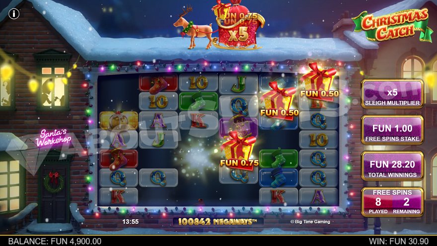 Reindeer sleigh appearing above the reels with gift multipliers in Christmas Catch slot.