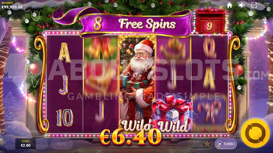 Free spins screen showing 8 remaining spins with Christmas theme and wild symbols
