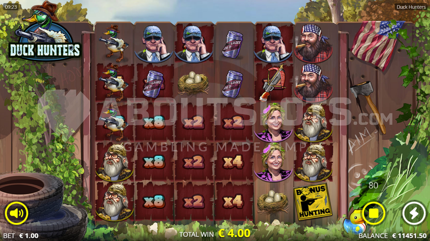 Base game view with 6x5 grid on wooden fence with nature background